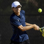 The Meadows junior Steven Tian competes during the tennis matches against Faith Lutheran at Fai ...