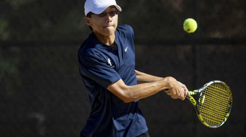 The Meadows junior Steven Tian competes during the tennis matches against Faith Lutheran at Fai ...